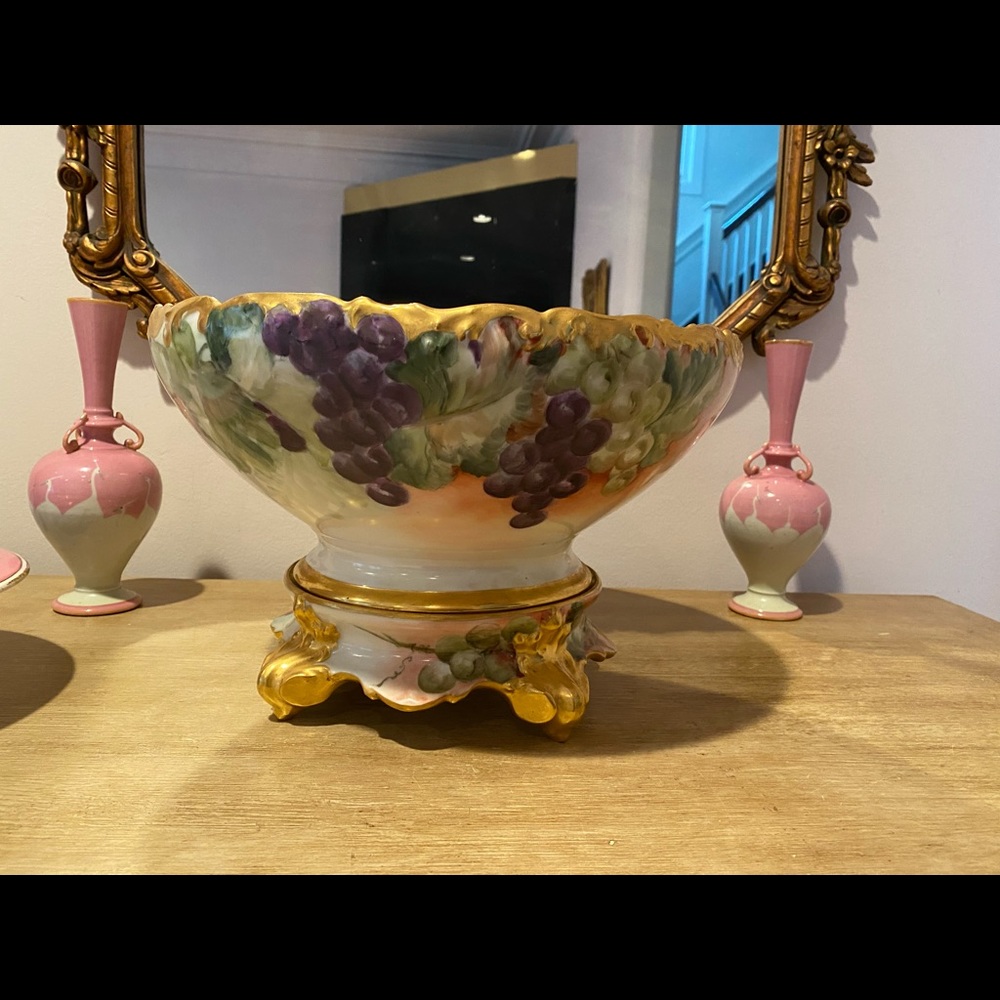 Handed paint bowl with matching base.